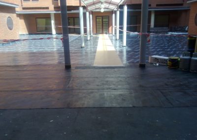 Rehabilitación de patio interior por reposición de la impermeabilización y del H. Impreso